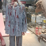 rising head zombie animatronic with light and sound in striped shirt

