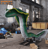 giant animatronic snake prop for haunted jungle scene
