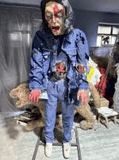 Insane Zombie Animatronic Prop – Bloody Mental Patient with Moving Arms & Sound