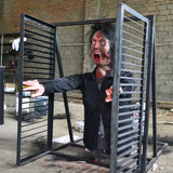 animatronic zombie jumping out of window with smoke effect for haunted attraction