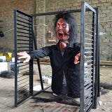 animatronic zombie jumping out of window with smoke effect for haunted attraction