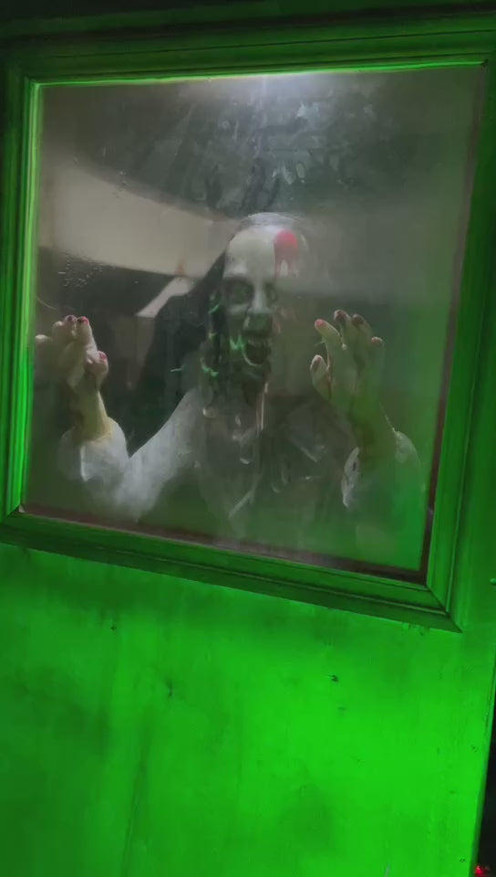 window jump scare zombie animatronic behind glass haunted house prop