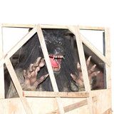 animatronic werewolf monster roaring through broken wooden wall in haunted house