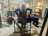 Zombie animatronic eating human intestines horror prop for haunted house